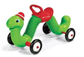 The Inch Worm, which was a worm shaped sit on toy with a saddle on it for our tiny bottoms. Really it was a scooter with shaped like a caterpillar with a green hat.